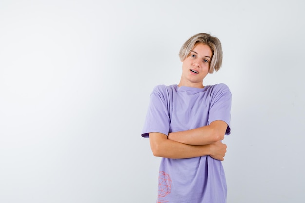 Expressive young boy posing in the studio