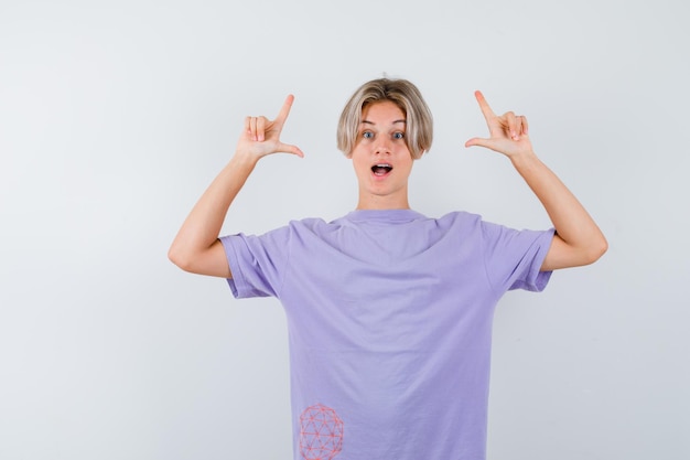 Expressive young boy posing in the studio