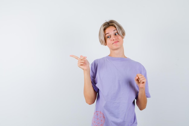 Expressive young boy posing in the studio