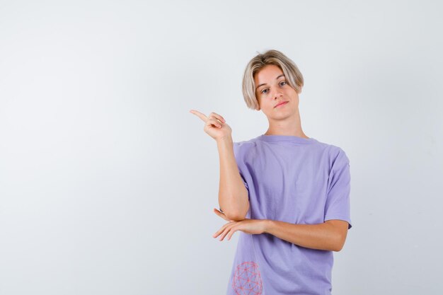 Expressive young boy posing in the studio