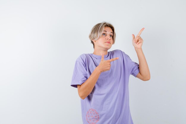 Expressive young boy posing in the studio