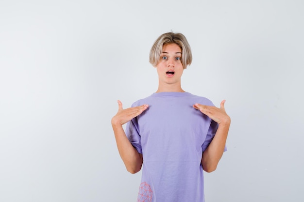 Expressive young boy posing in the studio