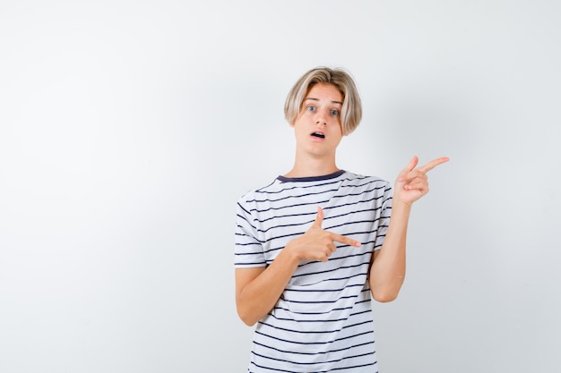 Expressive young boy posing in the studio