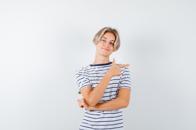 Expressive young boy posing in the studio