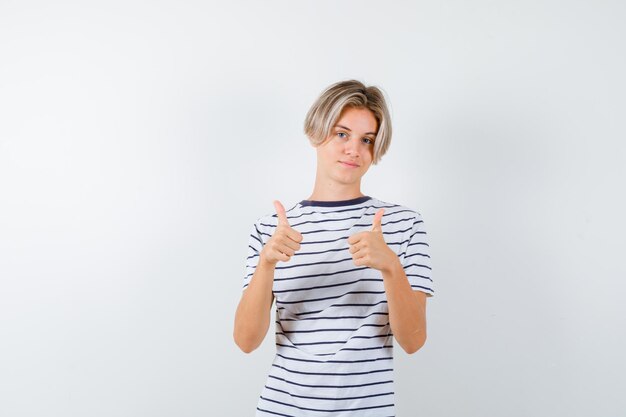 Expressive young boy posing in the studio