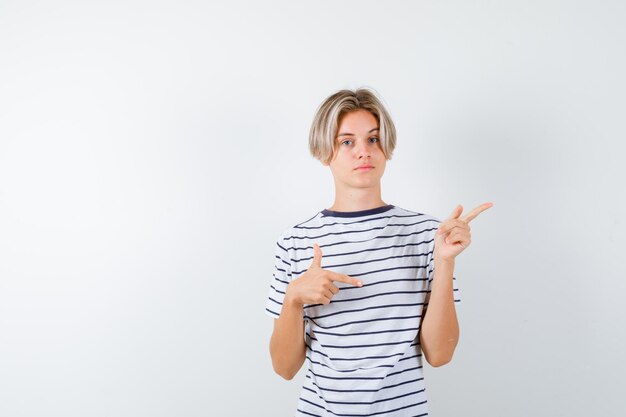 Expressive young boy posing in the studio