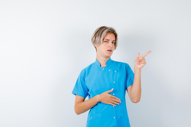 Expressive young boy posing in the studio