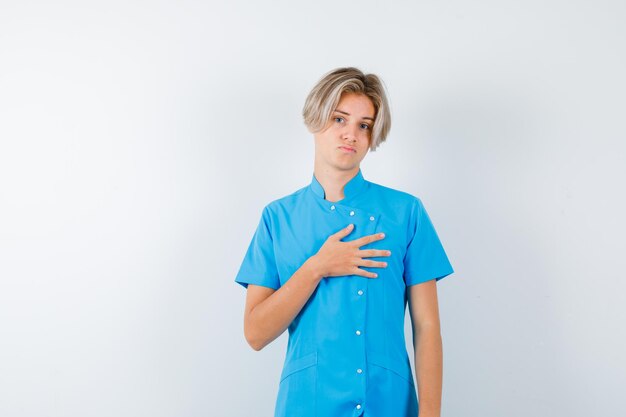 Expressive young boy posing in the studio