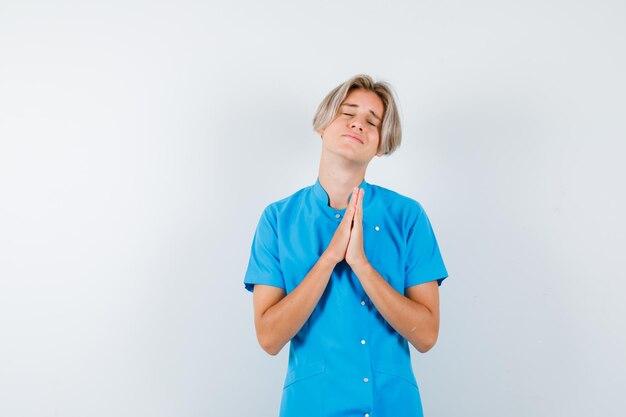 Expressive young boy posing in the studio