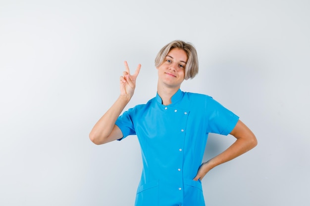 Expressive young boy posing in the studio