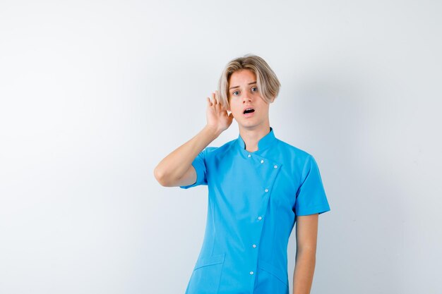 Expressive young boy posing in the studio