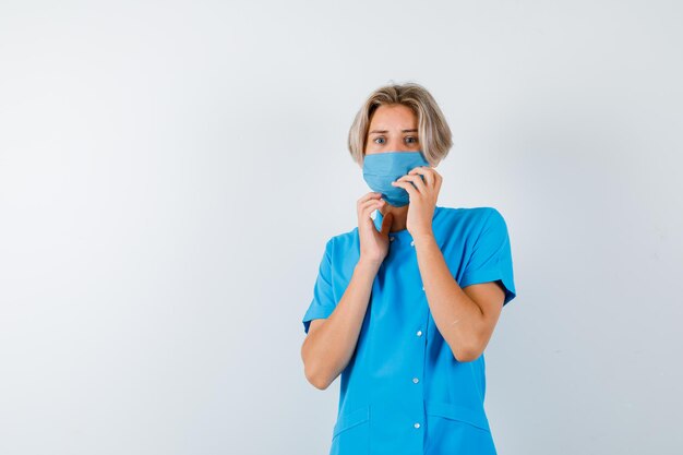 Expressive young boy posing in the studio