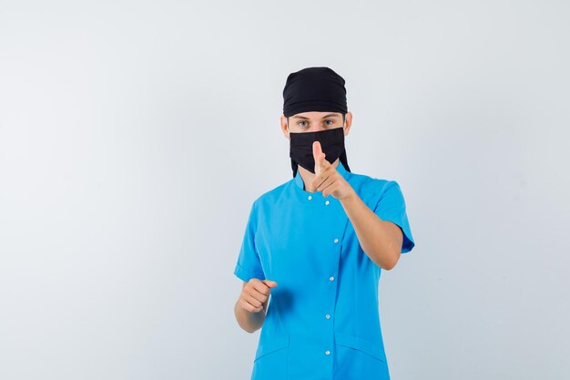 Expressive young boy posing in the studio