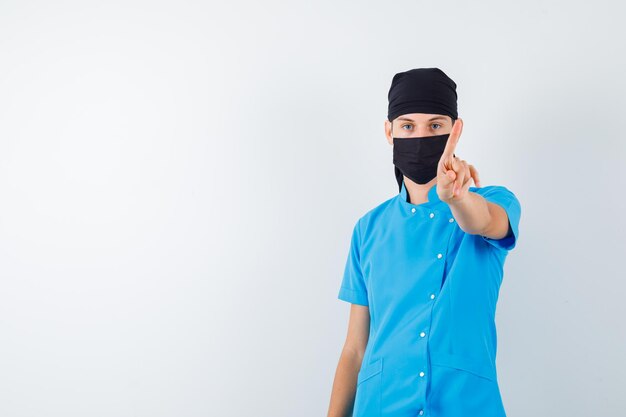 Expressive young boy posing in the studio