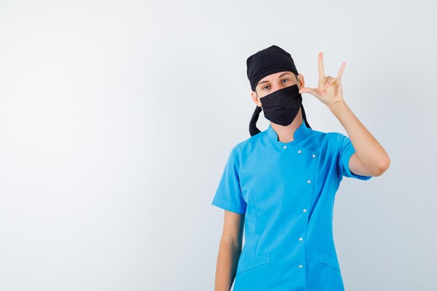 Expressive young boy posing in the studio