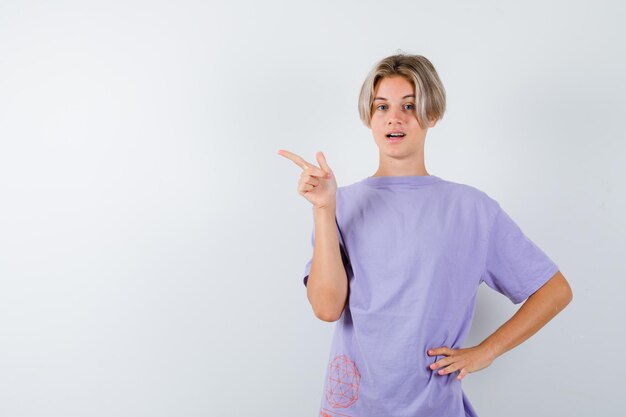 Expressive young boy posing in the studio