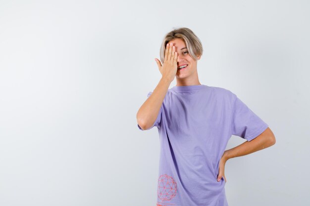 Expressive young boy posing in the studio