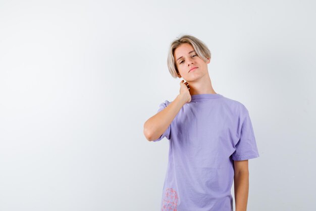 Expressive young boy posing in the studio