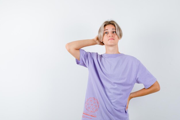 Expressive young boy posing in the studio