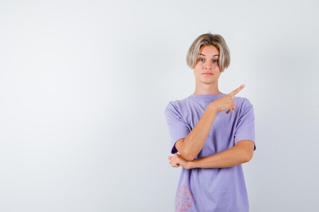 Expressive young boy posing in the studio