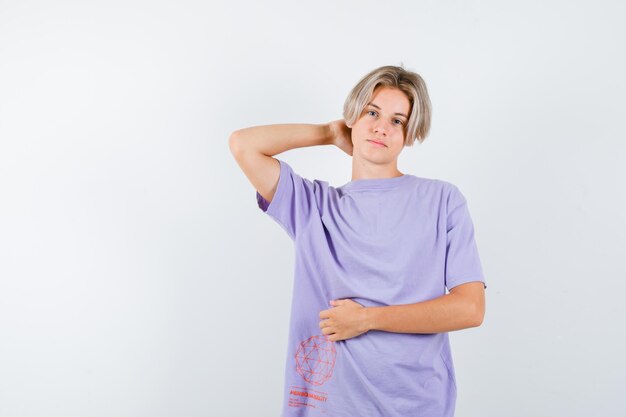 Expressive young boy posing in the studio