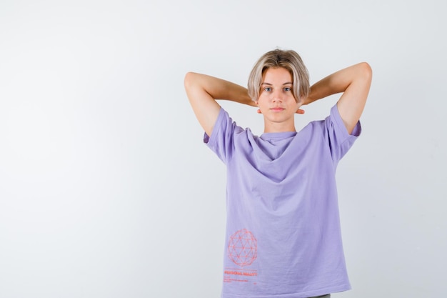 Expressive young boy posing in the studio