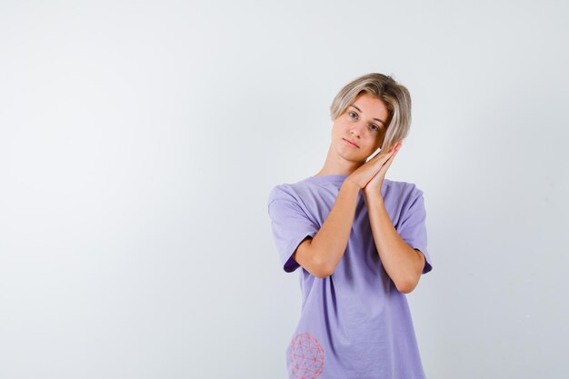 Expressive young boy posing in the studio