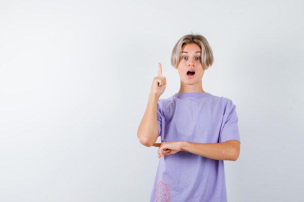 Expressive young boy posing in the studio