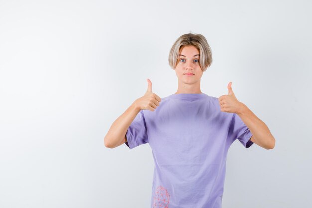 Expressive young boy posing in the studio