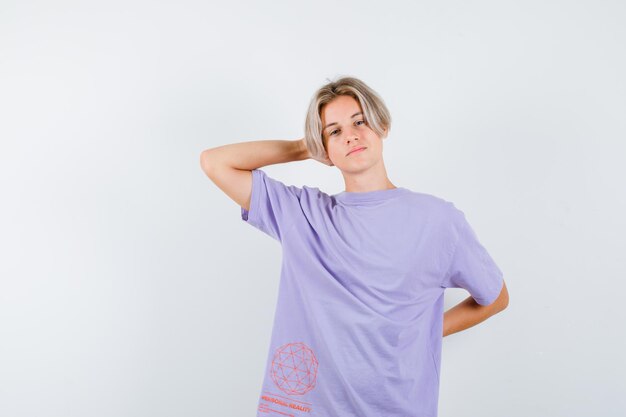 Expressive young boy posing in the studio