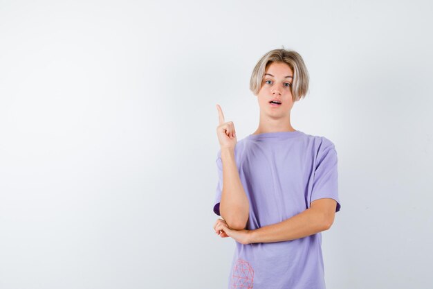 Expressive young boy posing in the studio