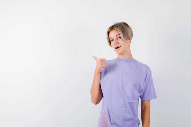 Expressive young boy posing in the studio