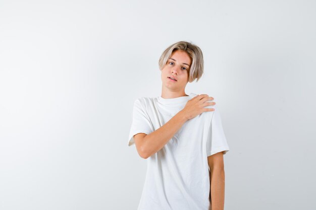 Expressive young boy posing in the studio