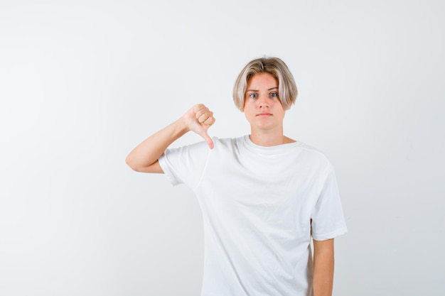 Expressive young boy posing in the studio