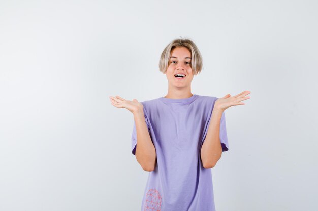 Expressive young boy posing in the studio