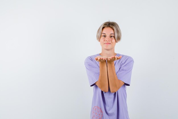 Expressive young boy posing in the studio