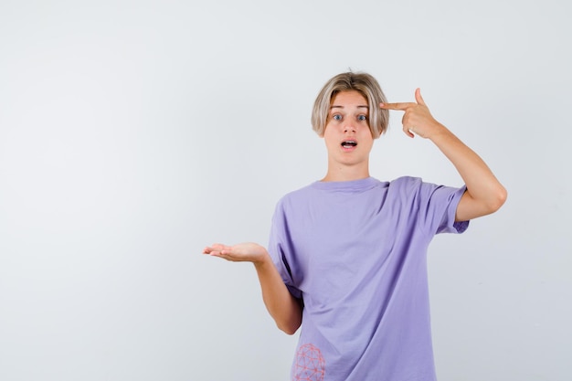 Expressive young boy posing in the studio