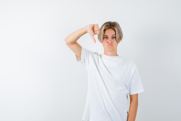 Expressive young boy posing in the studio