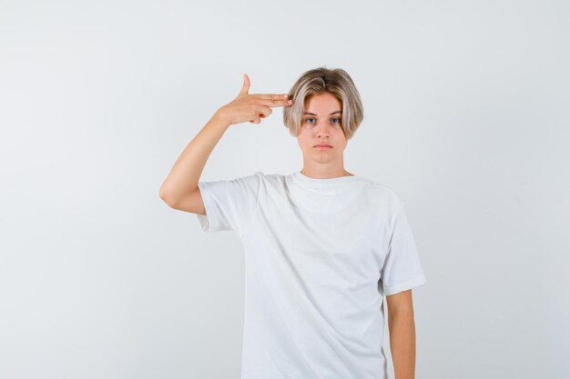 Expressive young boy posing in the studio