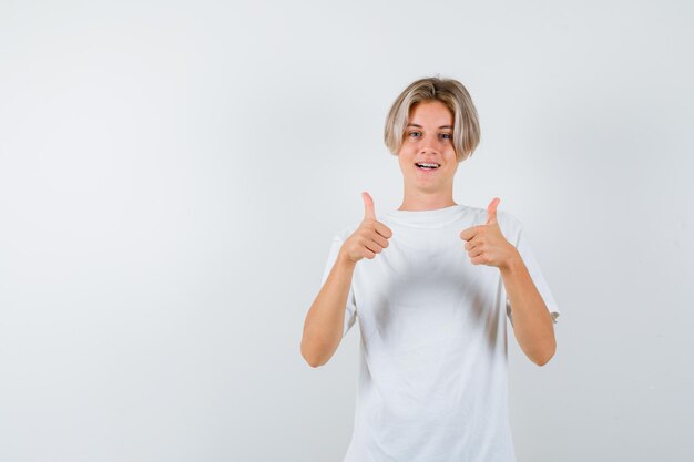 Expressive young boy posing in the studio