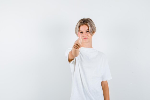 Expressive young boy posing in the studio