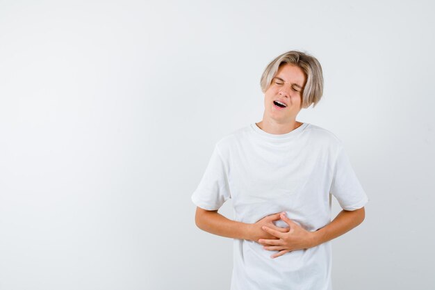 Expressive young boy posing in the studio