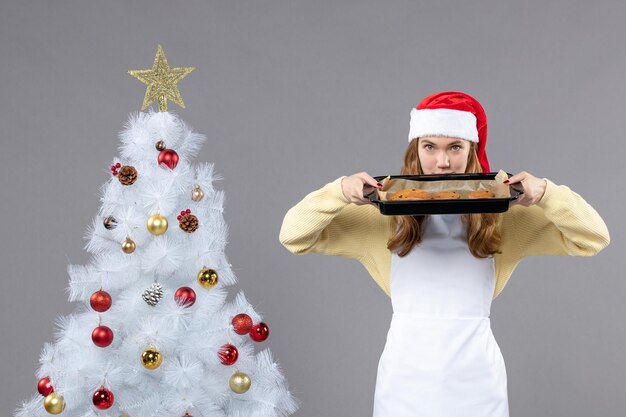 Expressive young cook posing for winter holidays