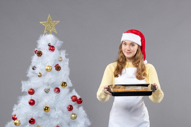 Expressive young cook posing for winter holidays