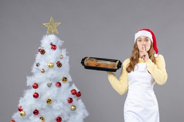 Expressive young cook posing for winter holidays