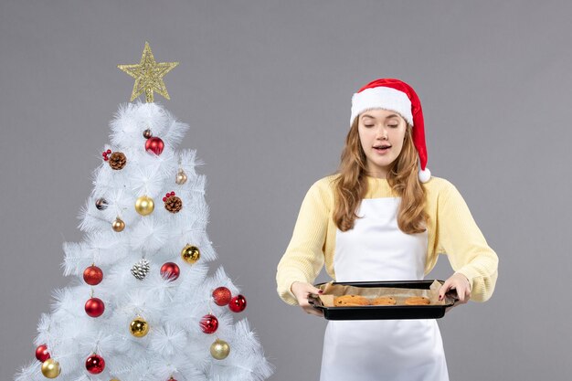 Expressive young cook posing for winter holidays