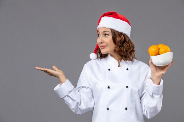 Expressive young cook posing for winter holidays