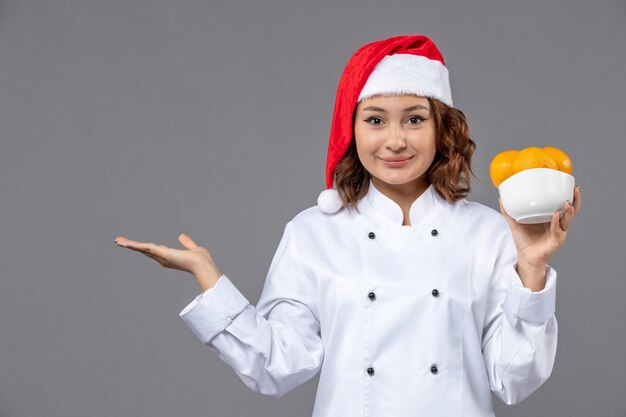 Expressive young cook posing for winter holidays