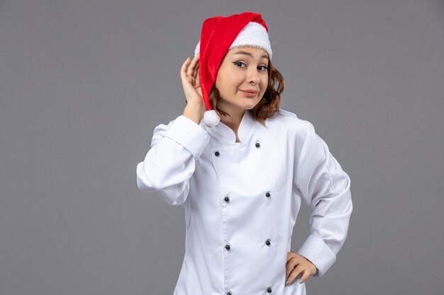 Expressive young cook posing for winter holidays