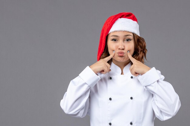 Expressive young cook posing for winter holidays